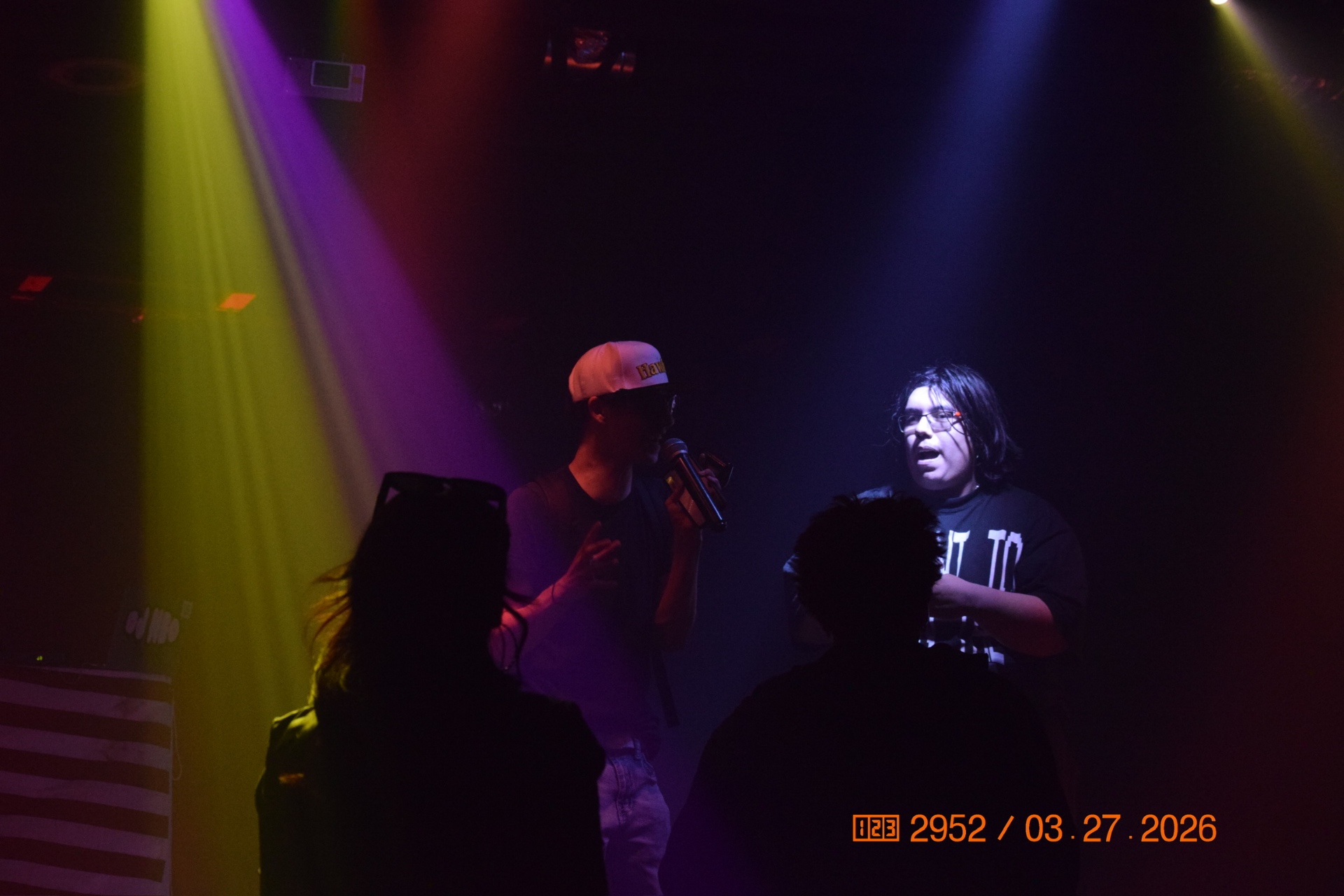Live performance on stage with stage lighting